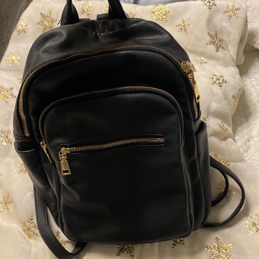 Black backpack used 3 times